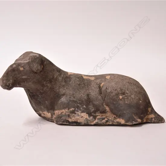 A Chinese reputedly Han Dynasty recumbent cow