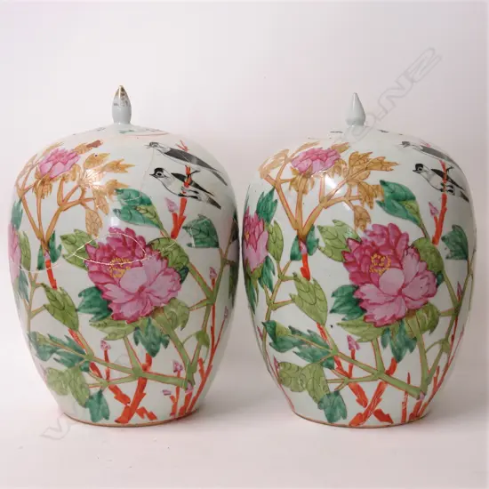 A pair of old Chinese polychrome painted lidded jars