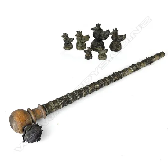 A set of eight opium weights and pipe