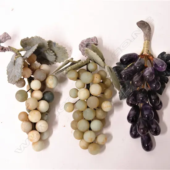 Three Oriental gemstone grape clusters