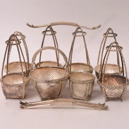 Eight 'Burmese Silver' mini baskets