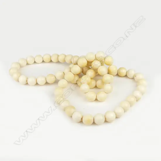 A vintage ivory bead necklace