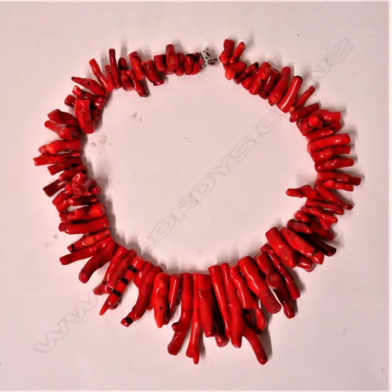 A large red toned branch coral necklace