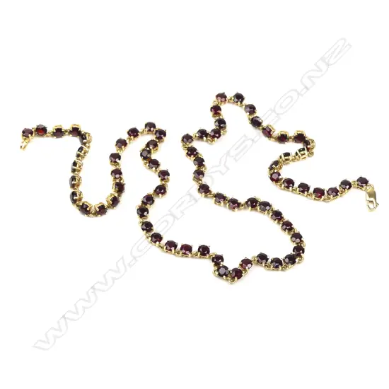 An 18ct gold and Bohemian garnet necklace