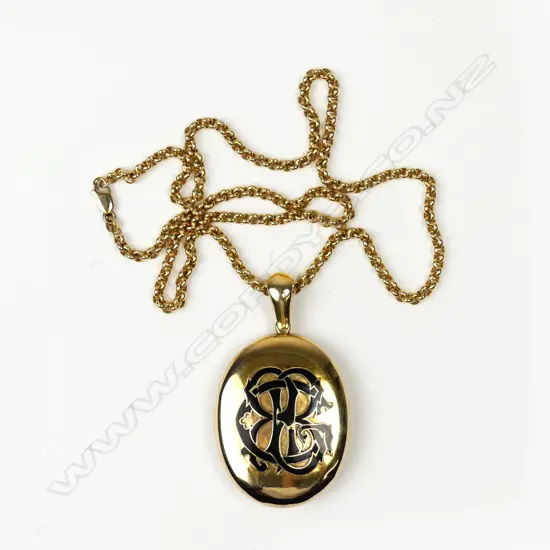 An impressive 18ct. yellow gold and enamelled locket on a modern 9ct. yellow gold chain
