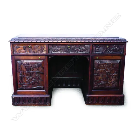 A Continental oak double pedestal desk