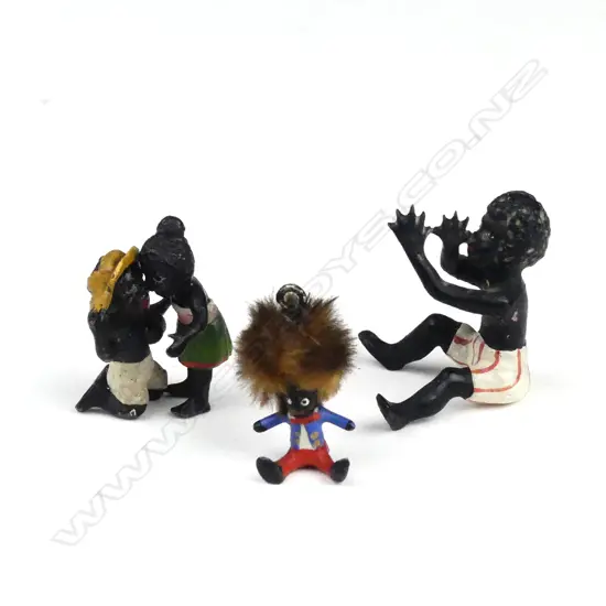 Two tiny cold painted cast metal studies of children