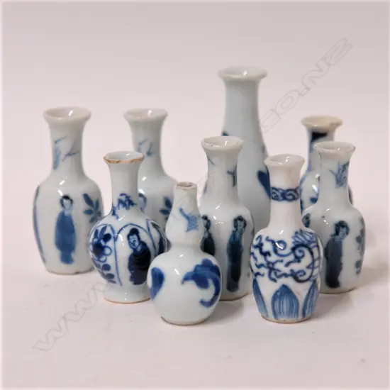 Nine old Chinese miniature blue and white porcelain vases