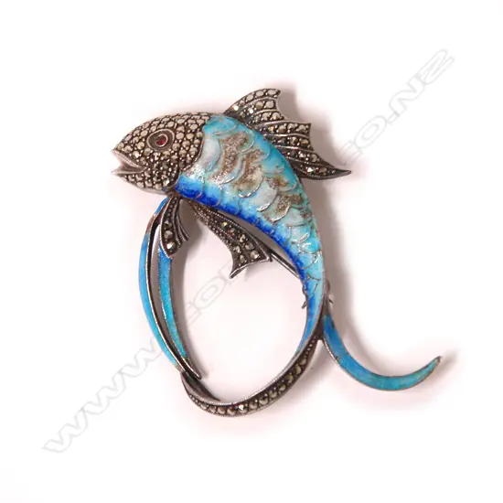 A stylish vintage silver enamel and marcasite fish brooch
