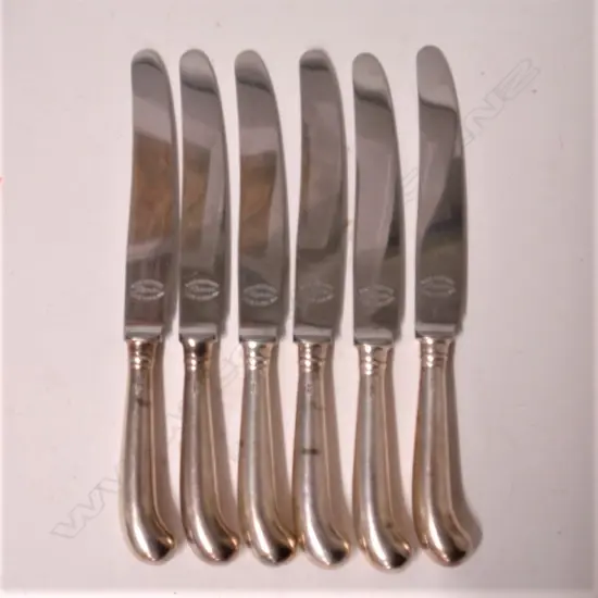 A set of six mid-20thC silver handled pistol grip knives