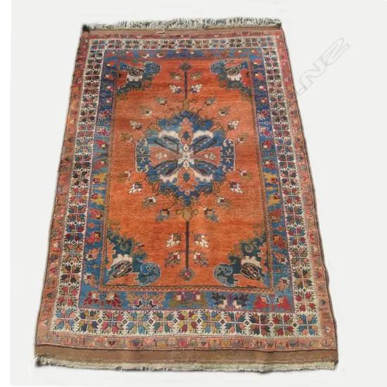 An old Turkish hand knotted carpet