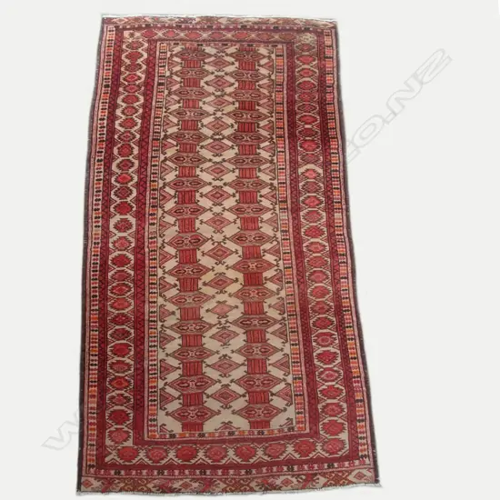 A hand knotted Persian rug