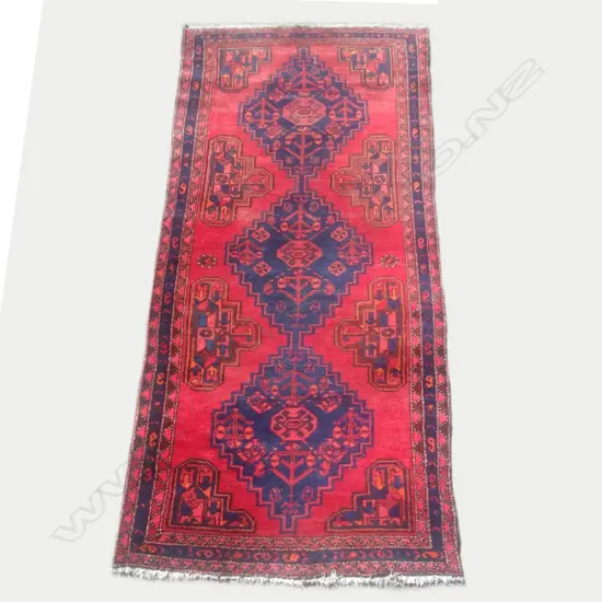 An old Turkish hand knotted rug