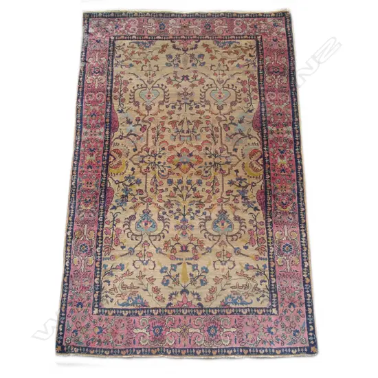 A hand knotted Persian rug
