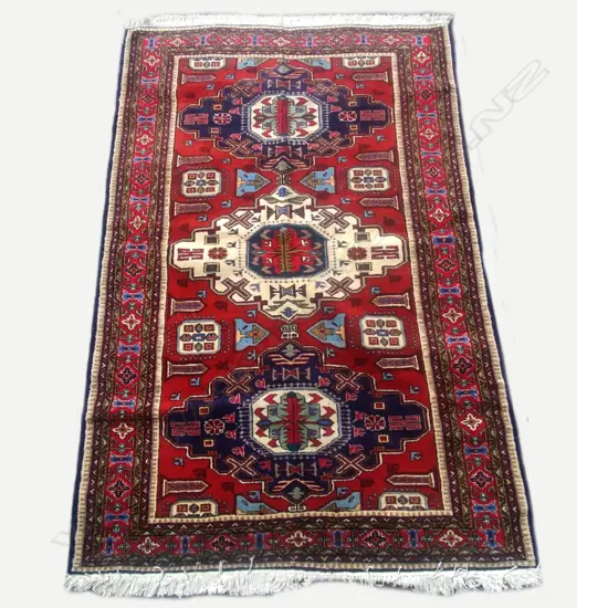 A hand knotted Persian carpet
