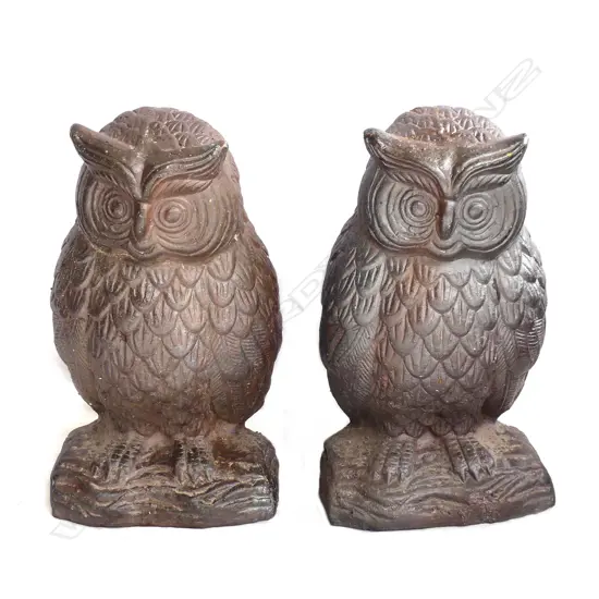 A pair of high fired stoneware garden owl statues