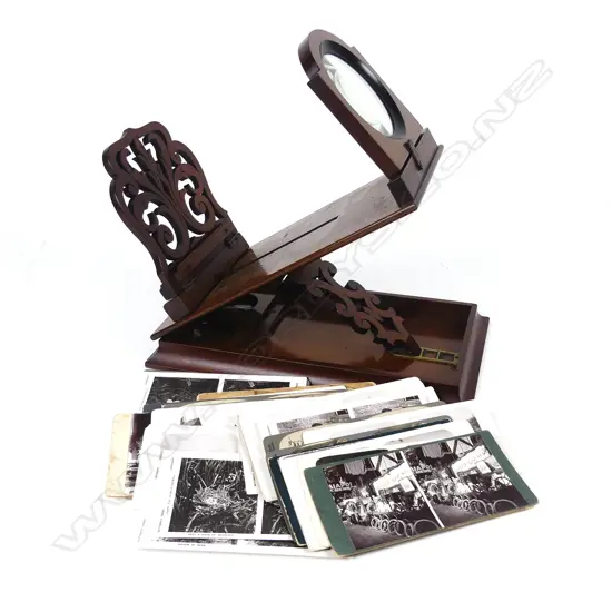A walnut tabletop stereoscope viewer