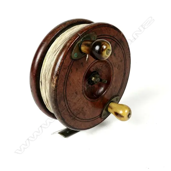 A large 6” English Gamages mahogany game/salmon reel
