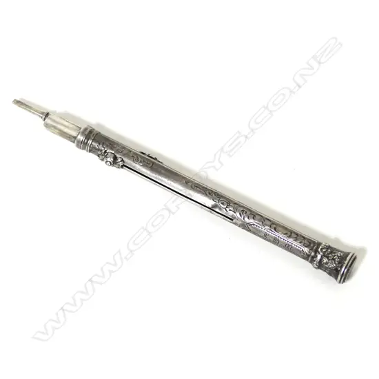 A silver propelling pen and pencil
