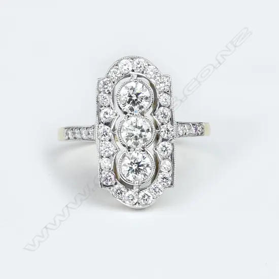An Art Deco style 18ct. yellow gold and multi-diamond set  dress ring