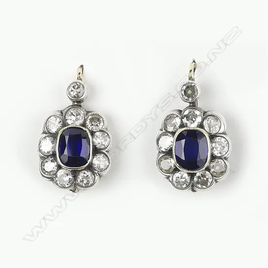 A pair of early 20thC white and yellow gold sapphire and diamond earrings