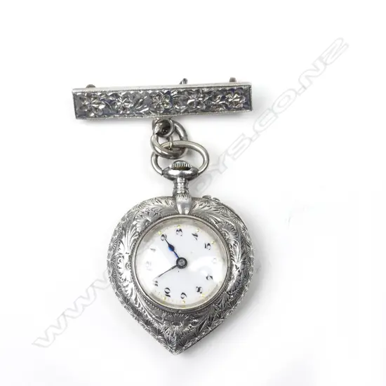 A lady's silver heart shaped pocket watch