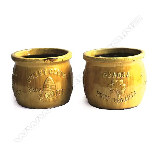 A pair of large caramel glazed 'Sweet Clover Honey' garden pots