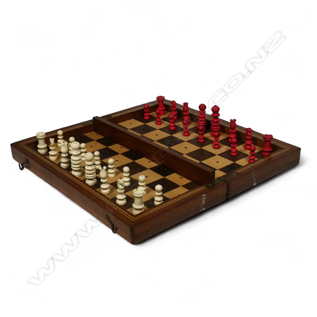A Victorian travelling turned carved and part red stained bone chess set, Image 1++