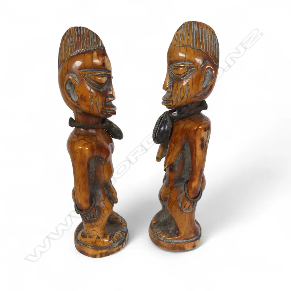 A pair of early 20thC Yoruba carved ivory Ibeji twins, Image 1++