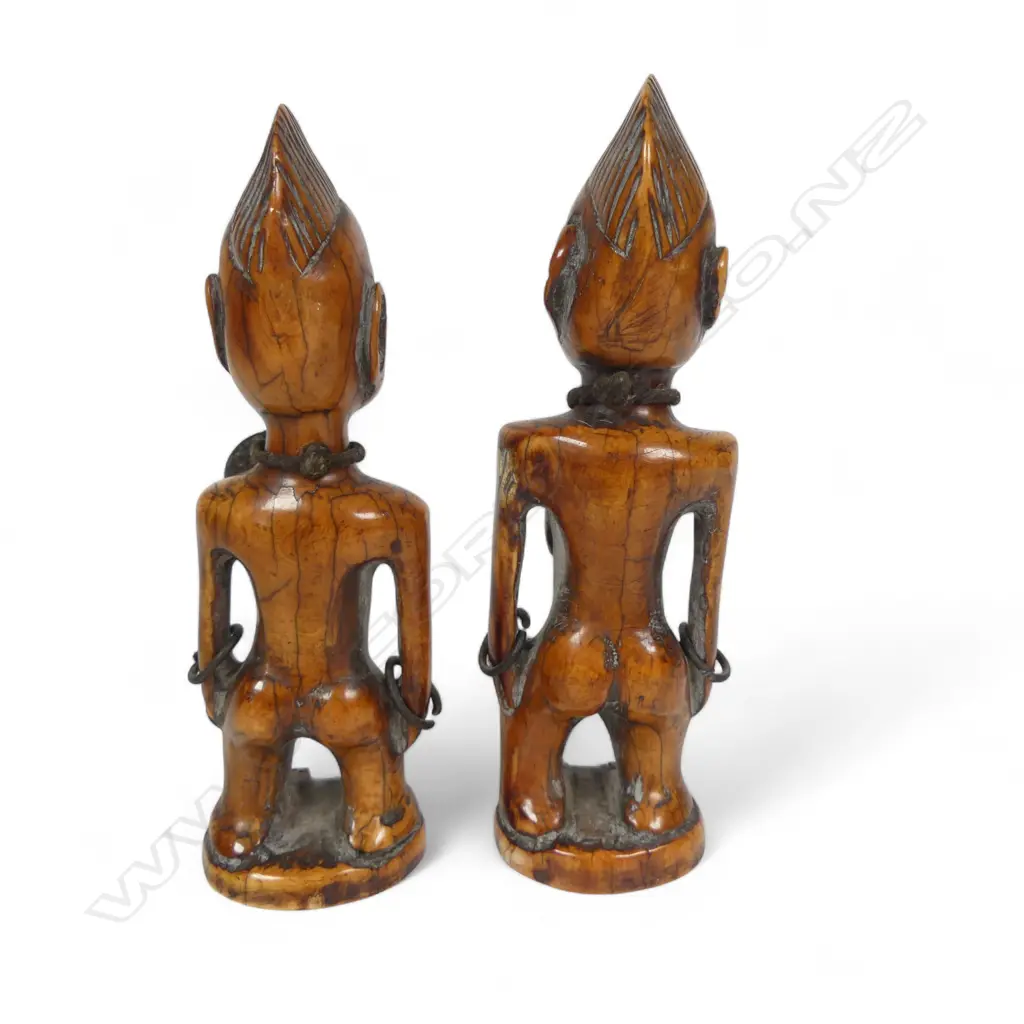 A pair of early 20thC Yoruba carved ivory Ibeji twins, Image 1++