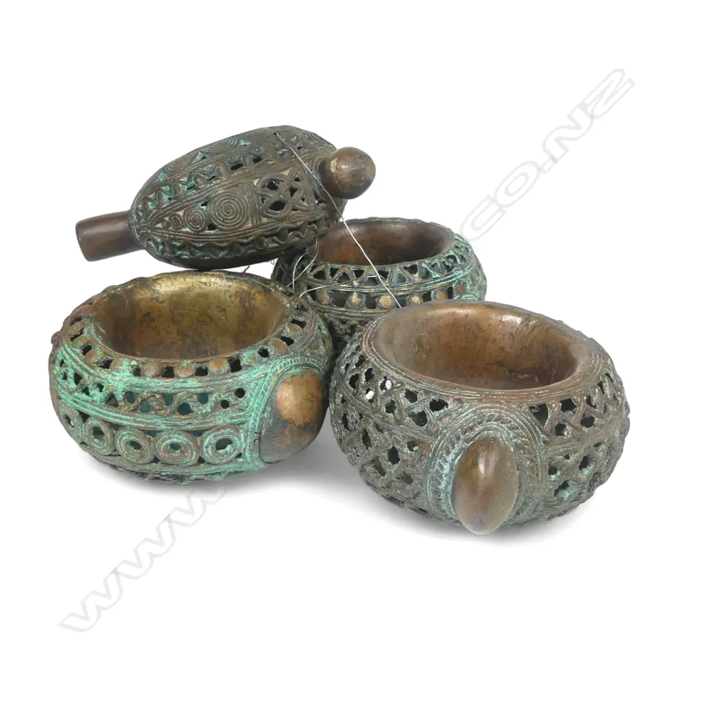 Four early 20thC Benin bronze currency bangles, Image 1++