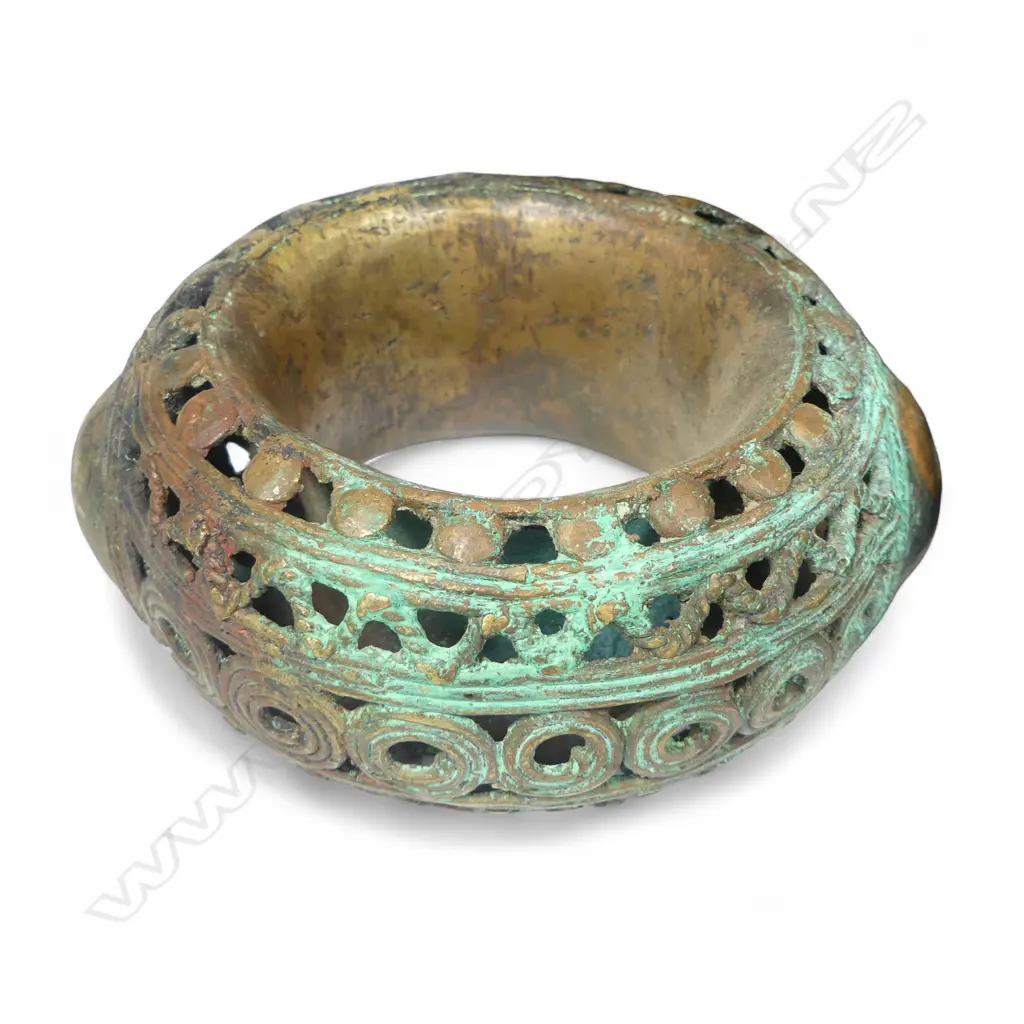 Four early 20thC Benin bronze currency bangles, Image 1++