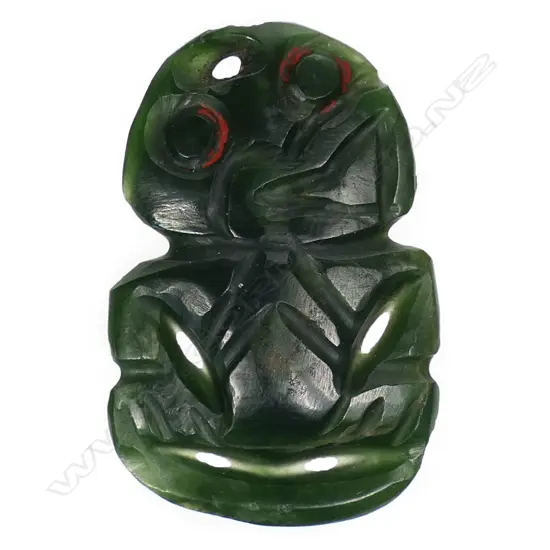An old Māori carved pounamu hei tiki,