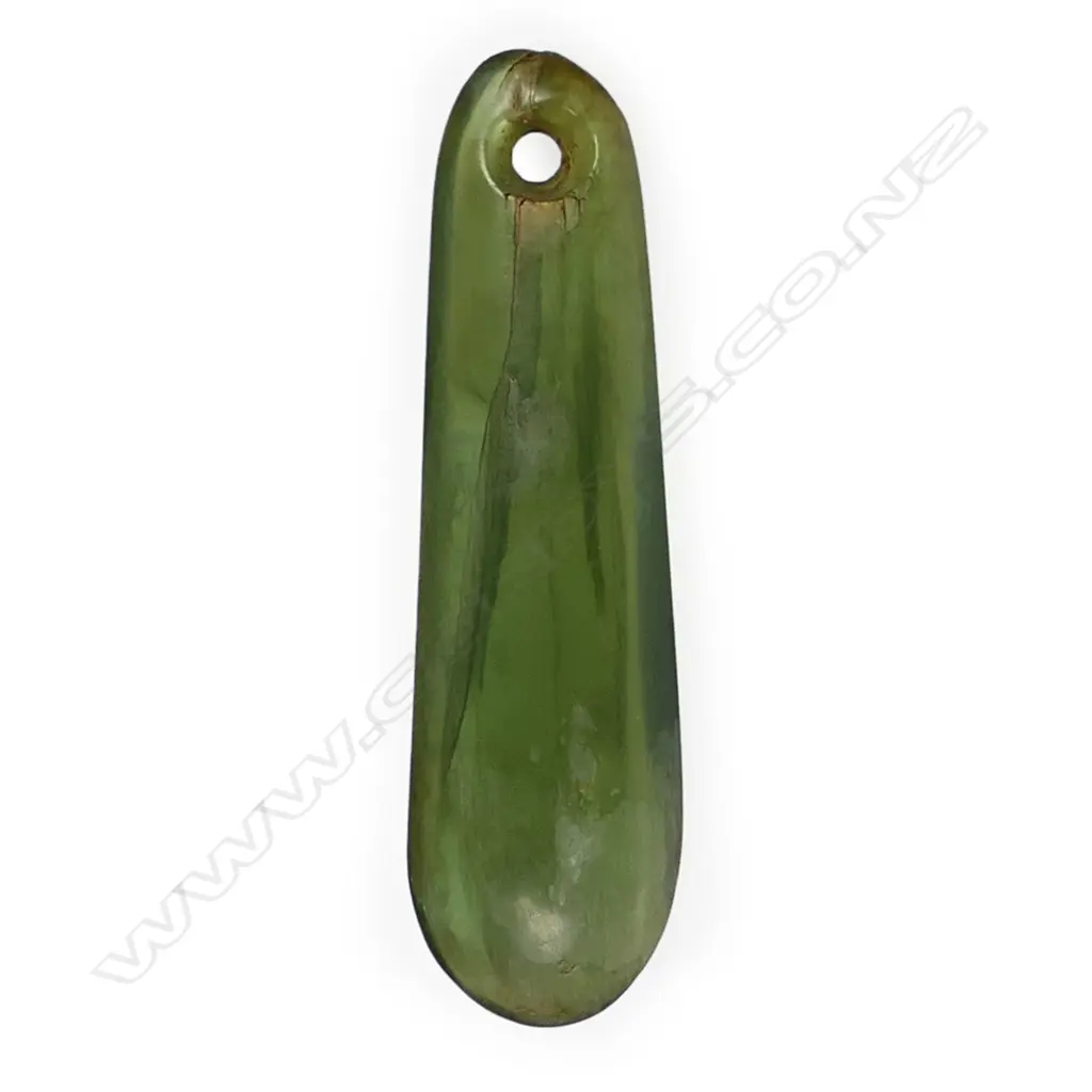 An old Māori pounamu kuru pendant, Image 1++