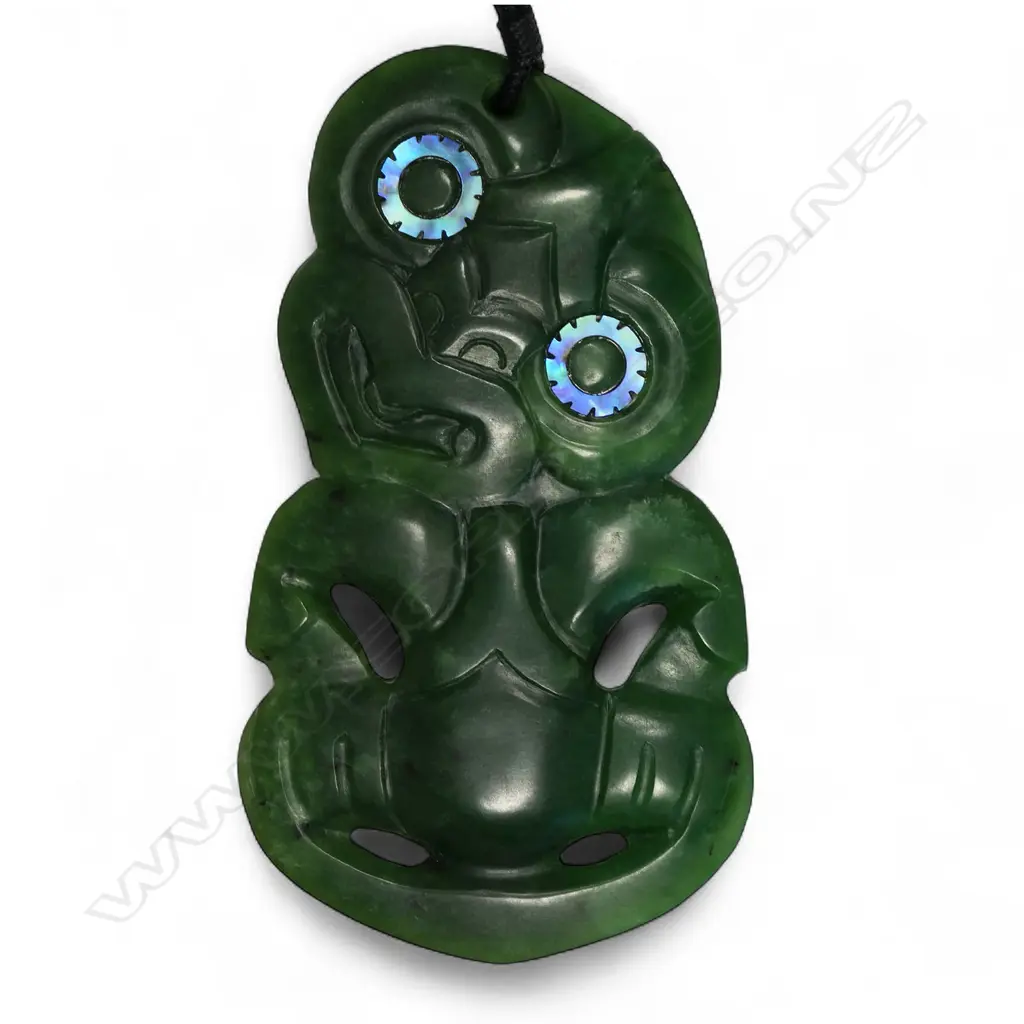 An uncommon modern Charlie Raponi Wilson carved Marsden Flower pounamu double sided hei tiki, Image 1++