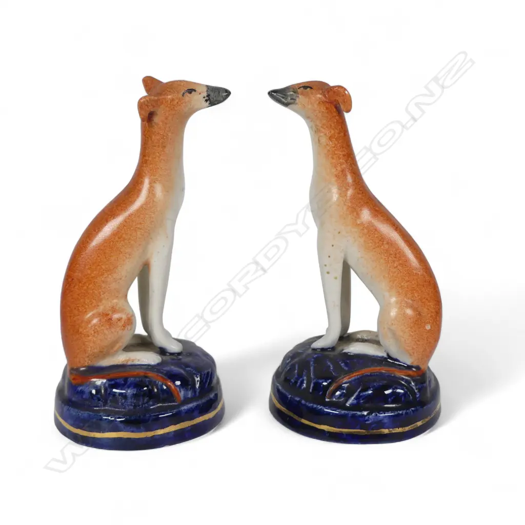 A pair of Victorian Staffordshire small seated hounds, Image 1++
