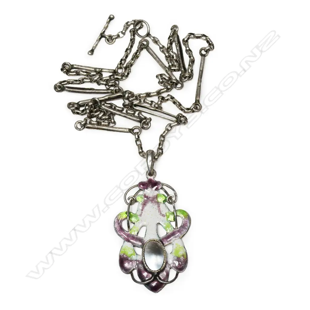 A rare New Zealand Arts & Crafts silver enamel and mother of pearl 'suffragist' pendant, Image 1++