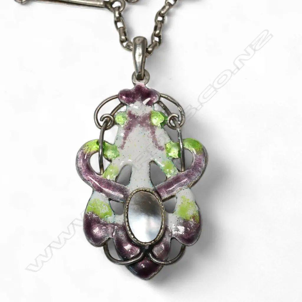 A rare New Zealand Arts & Crafts silver enamel and mother of pearl 'suffragist' pendant, Image 1++