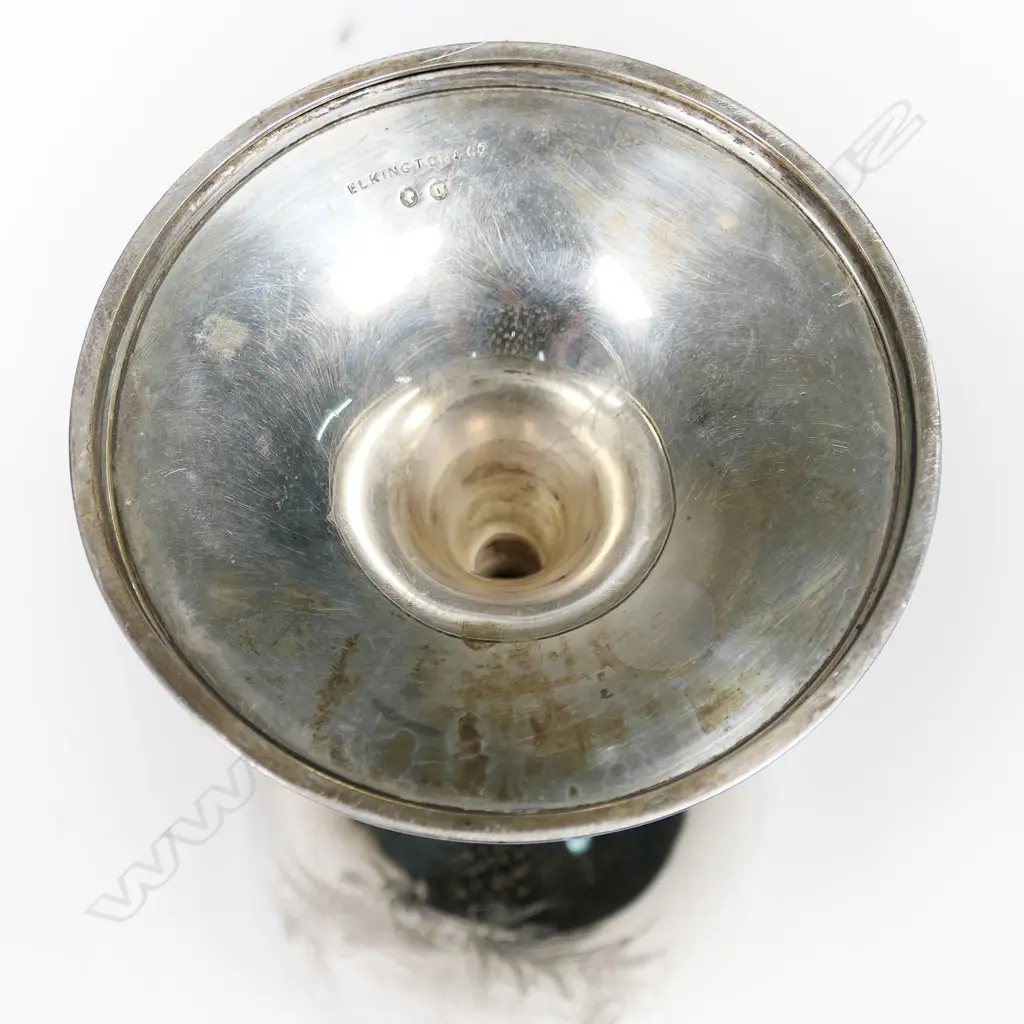 A New Zealand historical silver trophy cup - engraved 'Presented by The New Zealand Loan & Mercantile Agency Company To T.G. Smith, Wells Hill. For Best Pen 5 Merino Ewe Hoggets. Blenheim. 27th Nov. 1889'. Engraved to the front with a colonial mountain and pastoral landscape with sheep and a cow. H.235mm. 308gms Image 1++