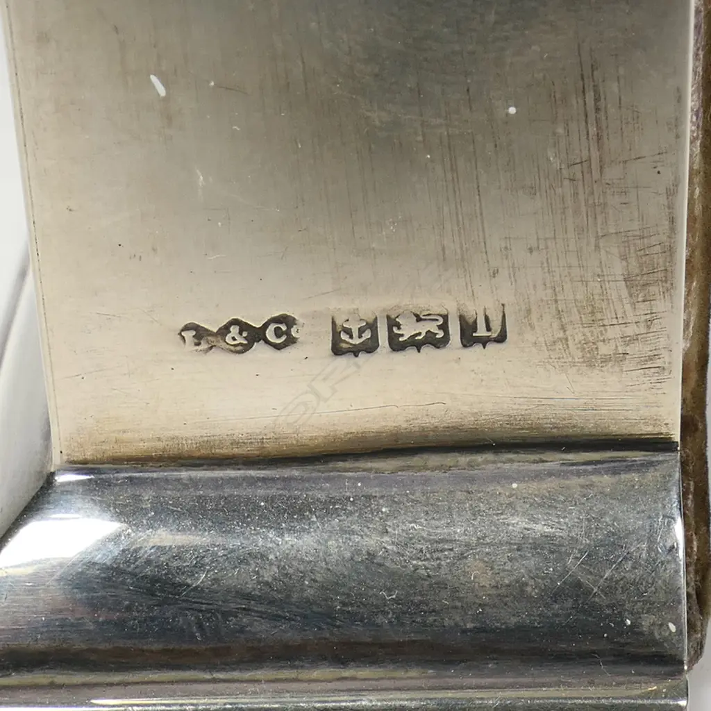 A Liberty & Co. Cymric silver-mounted clock, Image 1++