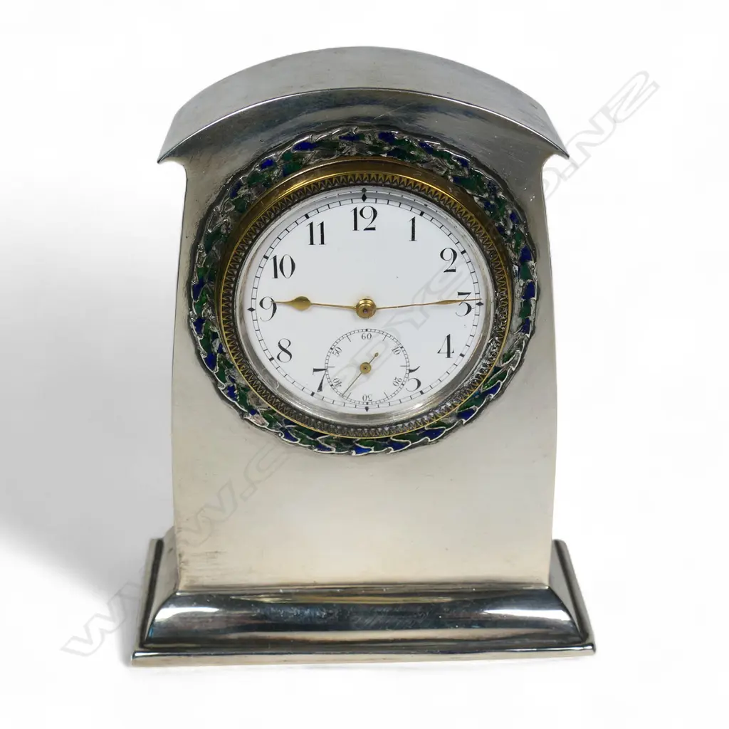 A Liberty & Co. Cymric silver-mounted clock, Image 1++