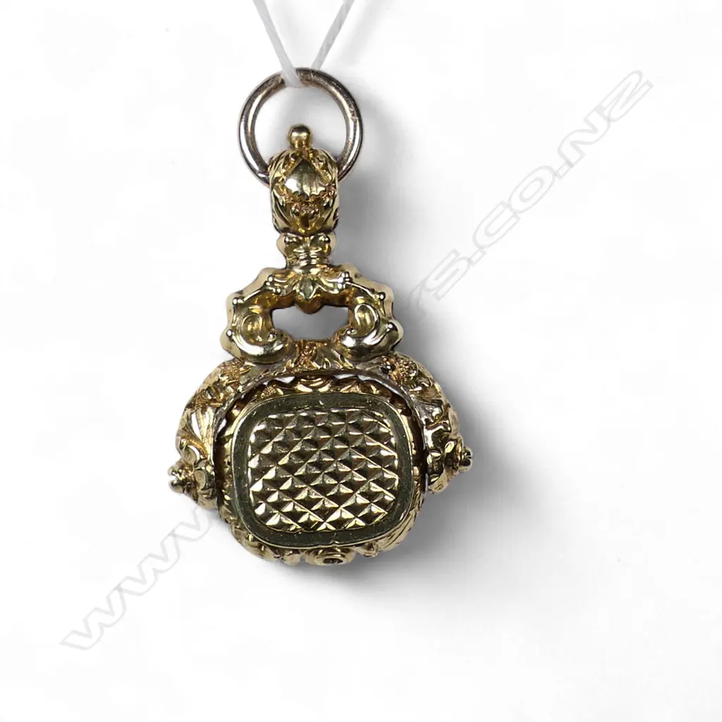 A fancy Victorian 15ct gold and amethyst fob spinner, Image 1++