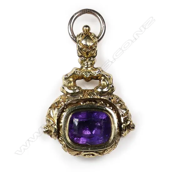 A fancy Victorian 15ct gold and amethyst fob spinner,