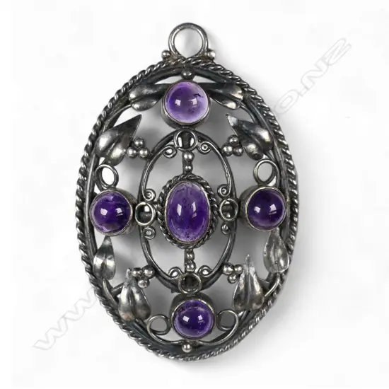 A rare Elsie Reeve (New Zealand 1885-1927) Arts & Crafts silver and amethyst pendant/brooch,