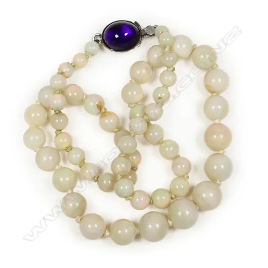 A vintage graduating strand of pale opal beads,