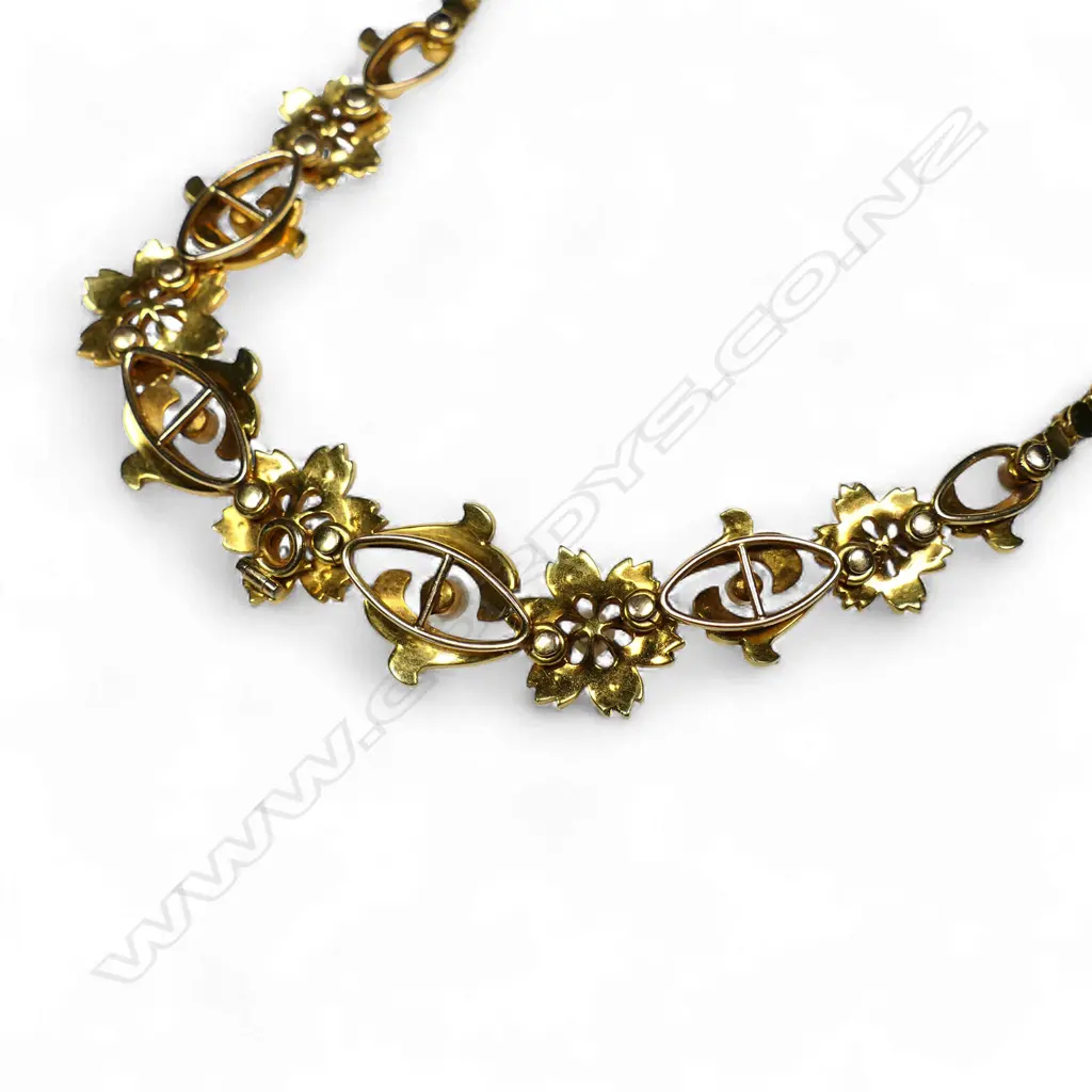 A late Victorian 15ct (or better) gold and seed pearl necklace and earring suite, Image 1++