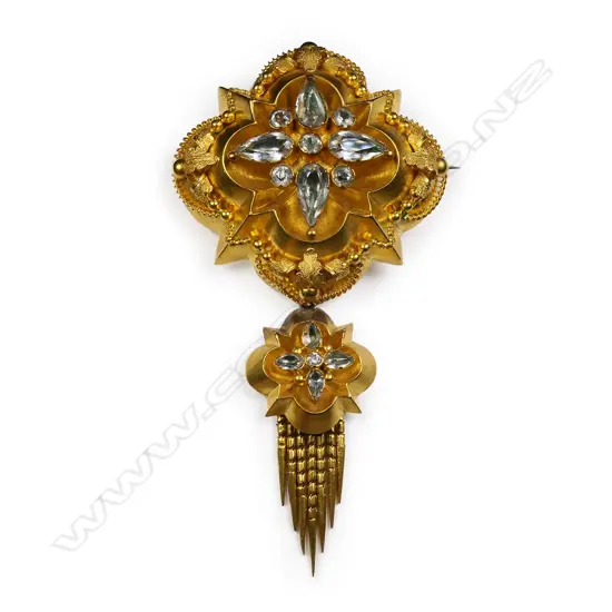 An impressive Victorian gilded 18ct gold and pale gem set brooch,