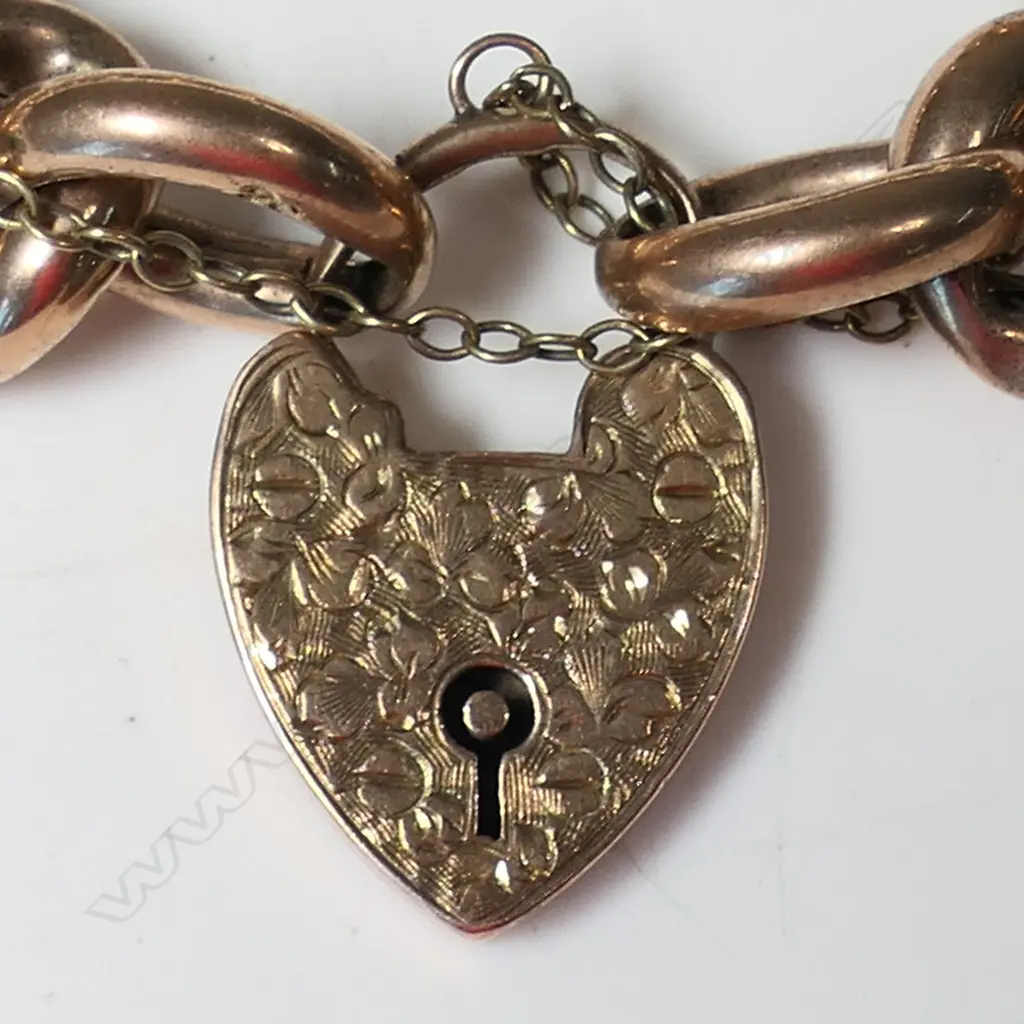 A c.1900 9ct rose gold curb link bracelet, Image 1++