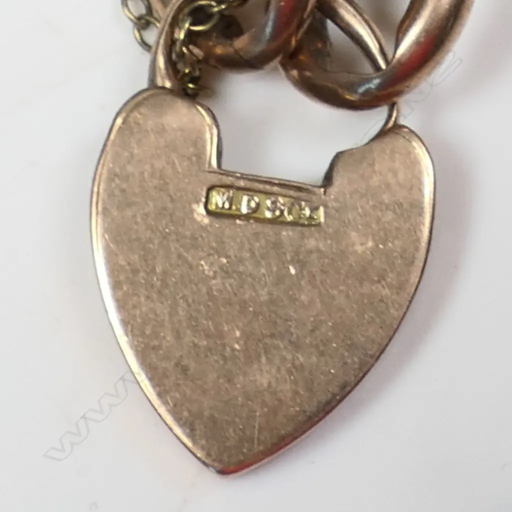 A c.1900 9ct rose gold curb link bracelet, Image 1++