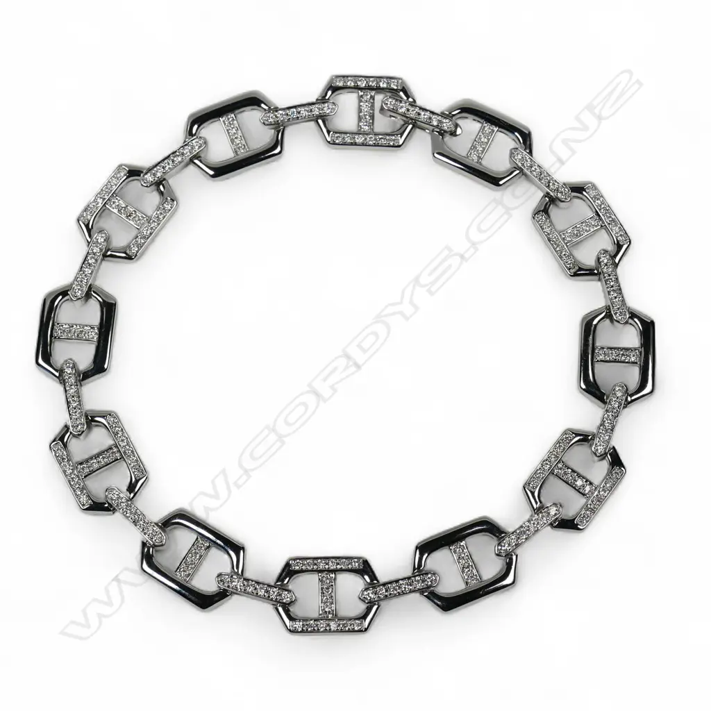 A 9ct white gold and diamond bracelet, Image 1++